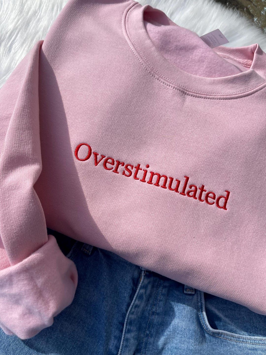 Pink sweatshirt with red embroidered wording — Pinterest inspiration