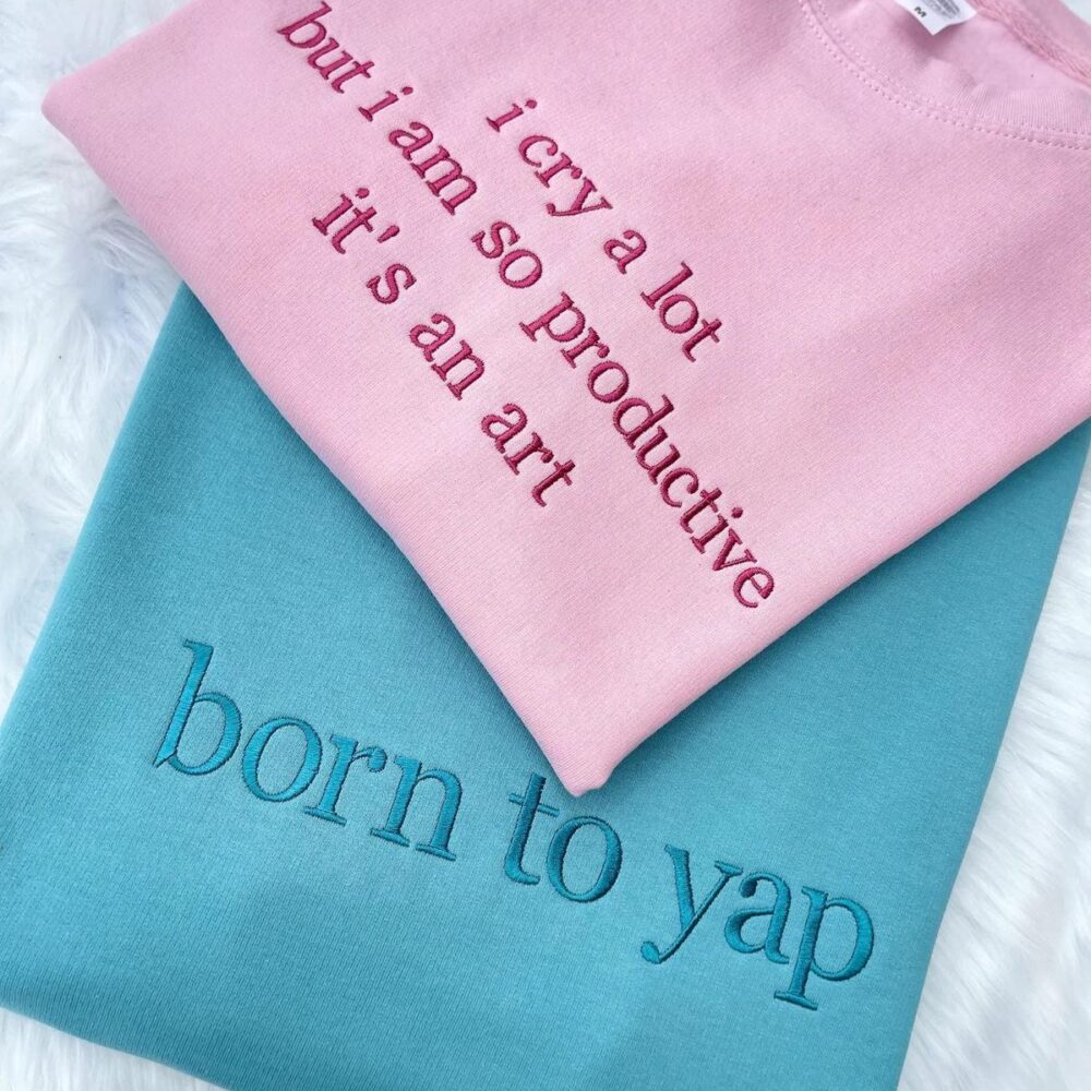 Pink and turquoise sweatshirts with embroidered quotes — Pinterest inspiration