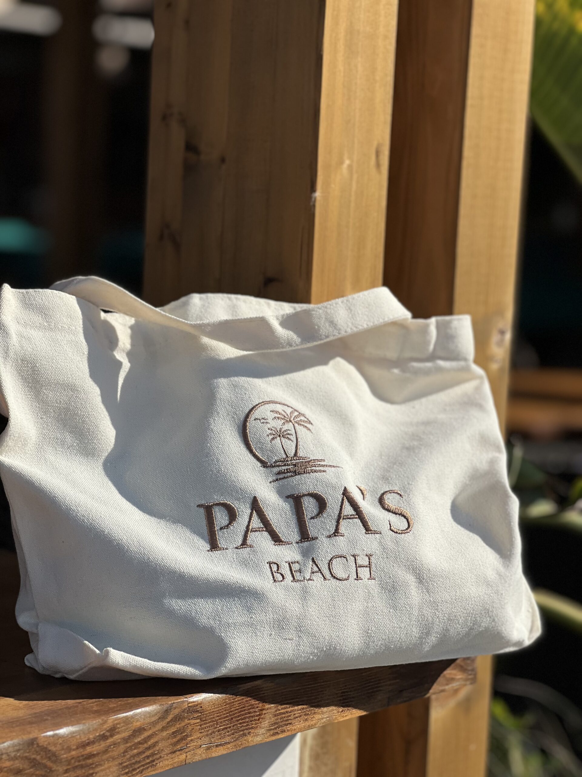 Cream tote with embroidered PAPAS Beach branding