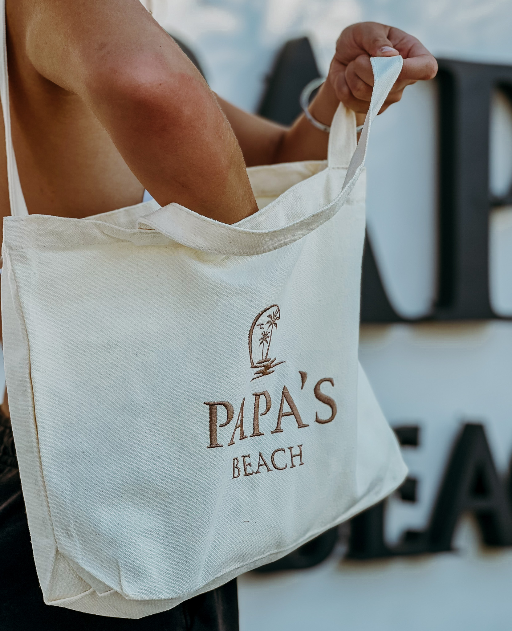 Cream tote with embroidered PAPAS Beach branding