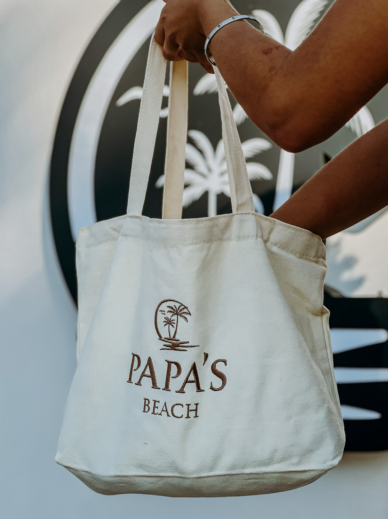 Cream tote with embroidered PAPAS Beach branding