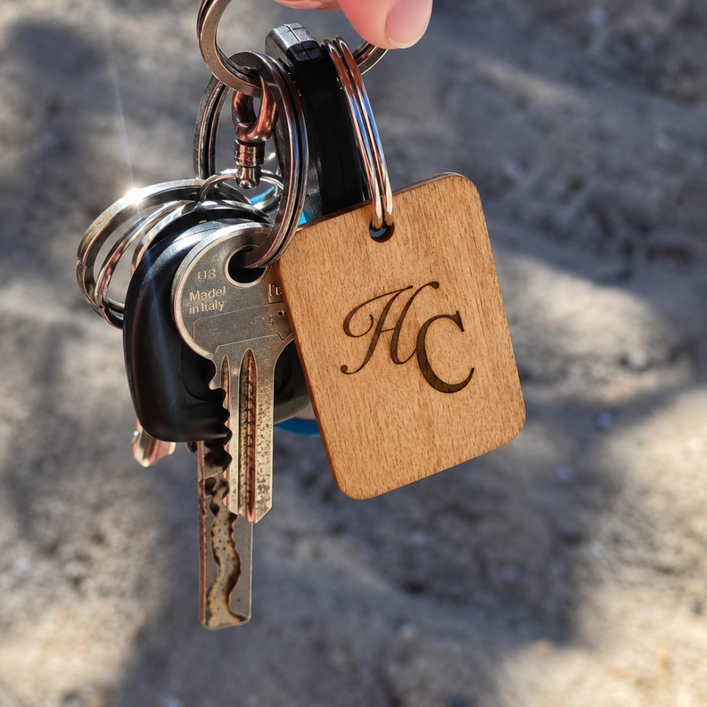 Laser-engraved wooden wedding keychain, Design 1 — intertwined initials