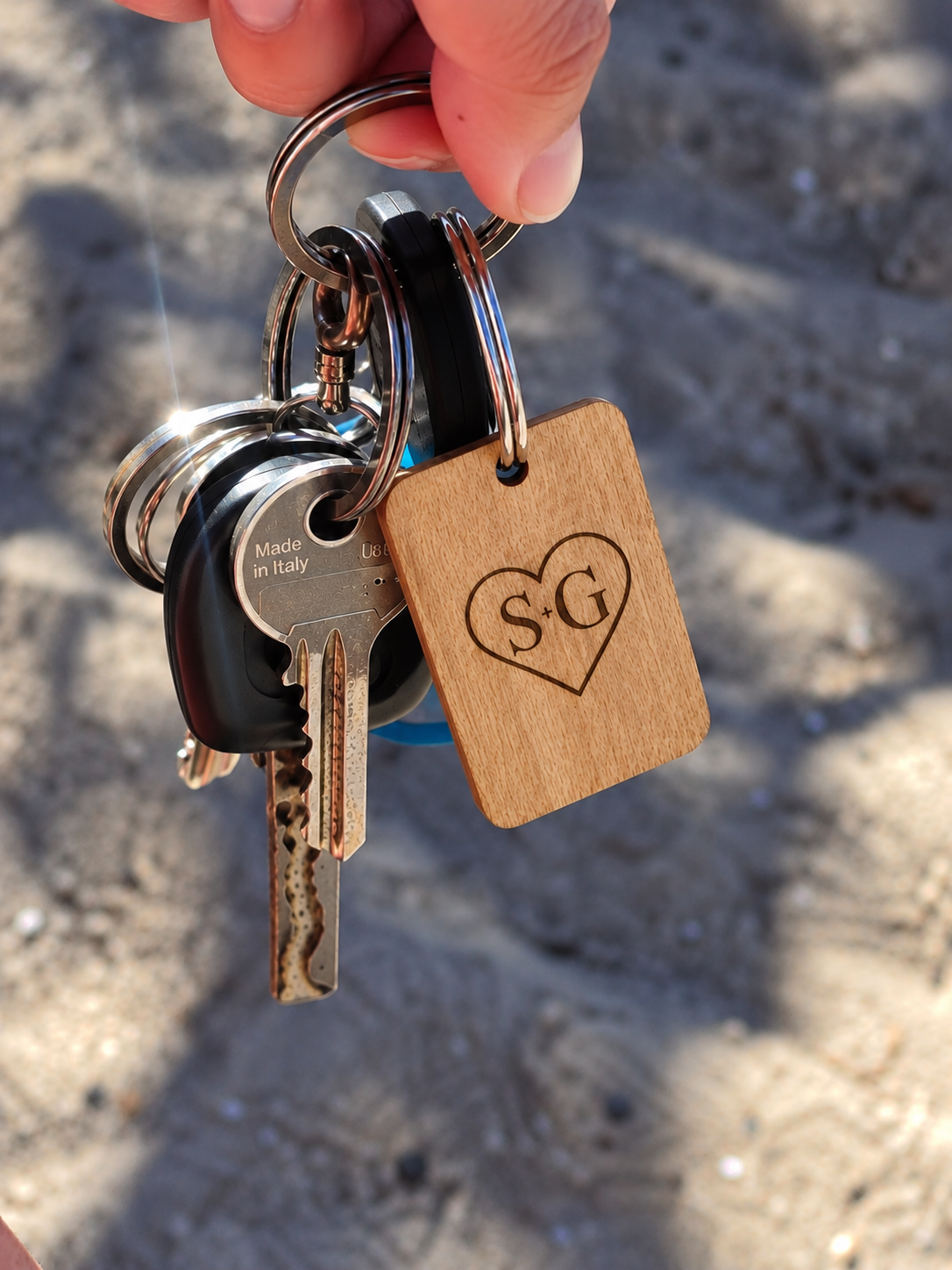 Laser-engraved wooden wedding keychain, Design 3 — initials inside a heart